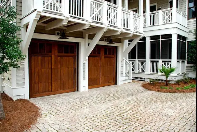 two nice wood garage doors with windows