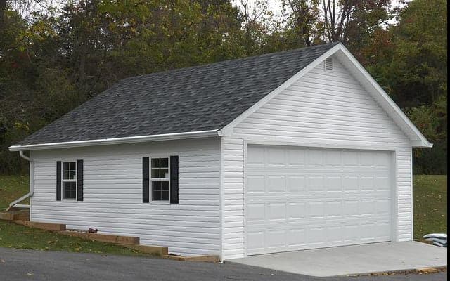 double white panel garage door of detached garage