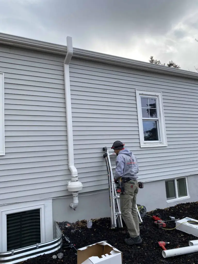Installing PVC gutters from the fan to the roof 2